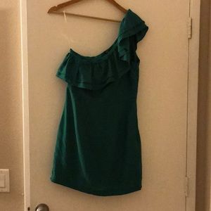 Emerald green one shoulder dress.